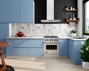 A modern kitchen installed by Kitchen Fitters Basingstoke with blue cabinets and white appliances.